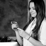 woman looking at phone