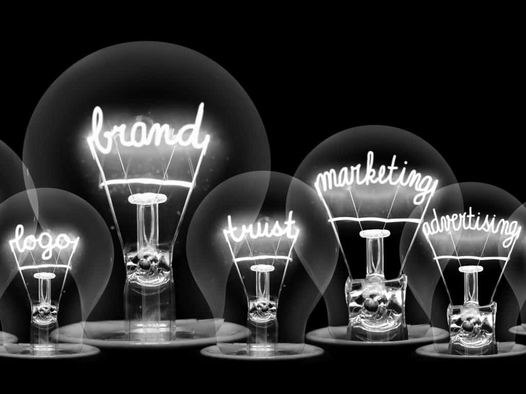 light bulbs containing marketing words in the filaments B&W