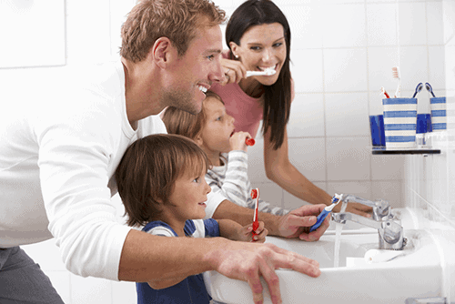 Family Brushing Teeth