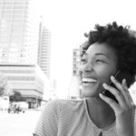 A woman talking on the phone - Golden Proportions Marketing